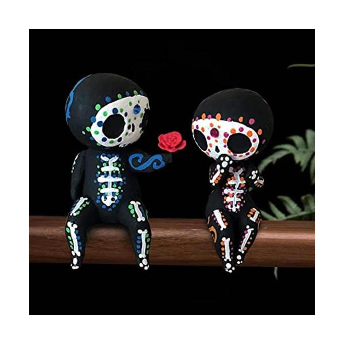 Estatua de pareja de calavera de azúcar
